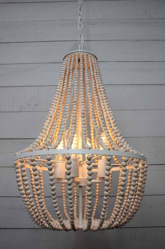 Four light multi light wooden beaded pendant in matt white finish perfect for coastal homes