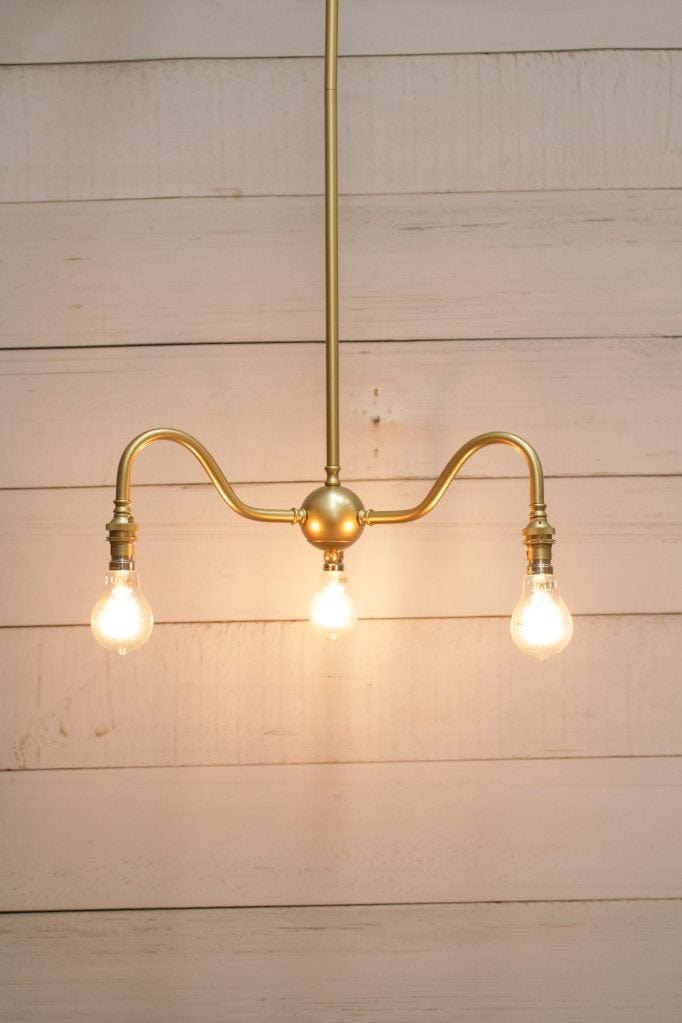 Industrial gooseneck chandelier in gold steel