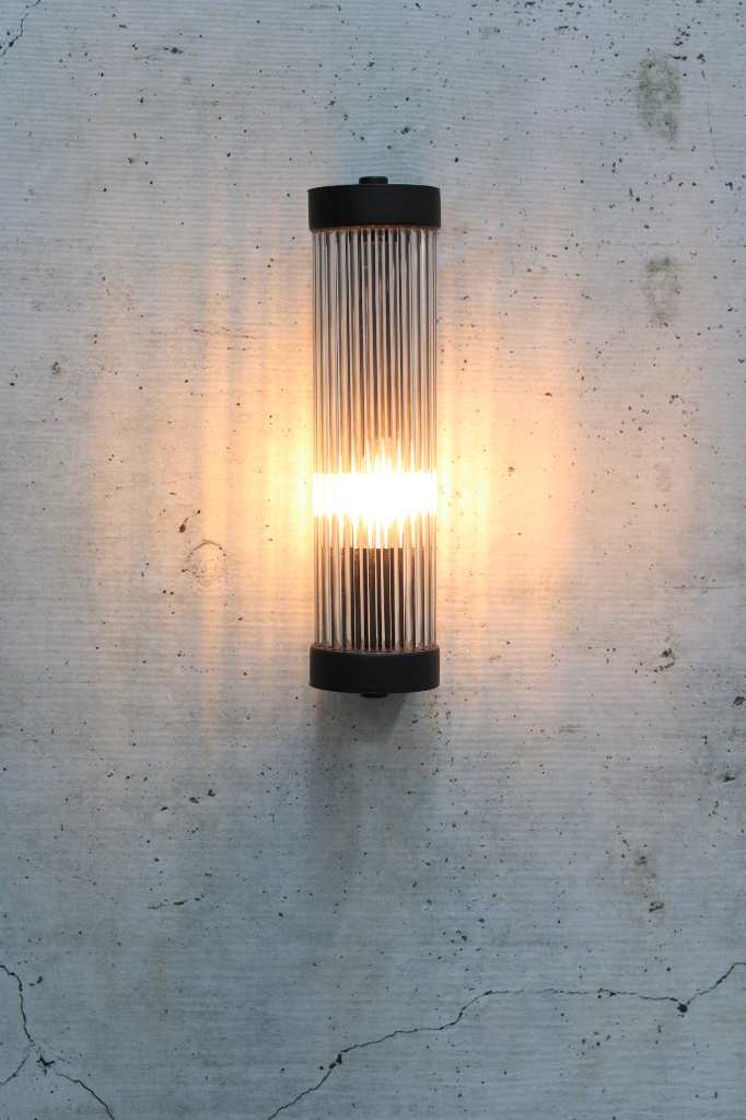 glass rod wall light in black finish