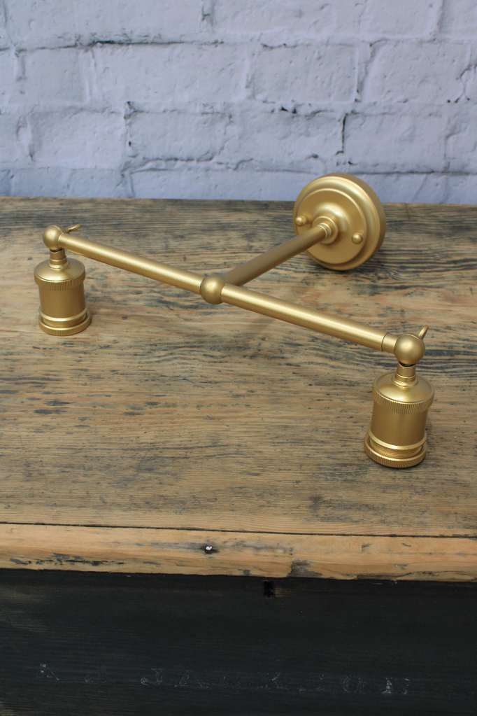 Double swivel arm in gold