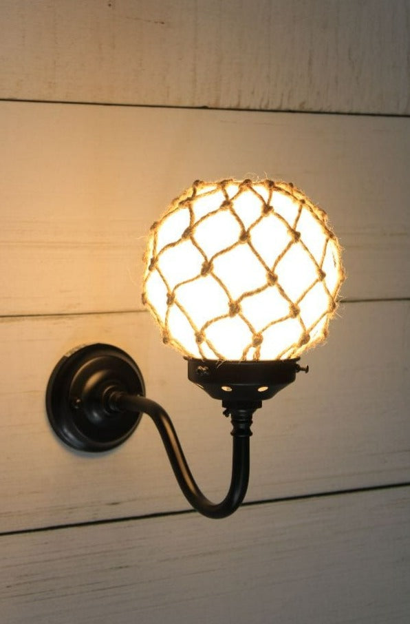 Gooseneck black wall light with small opal shade