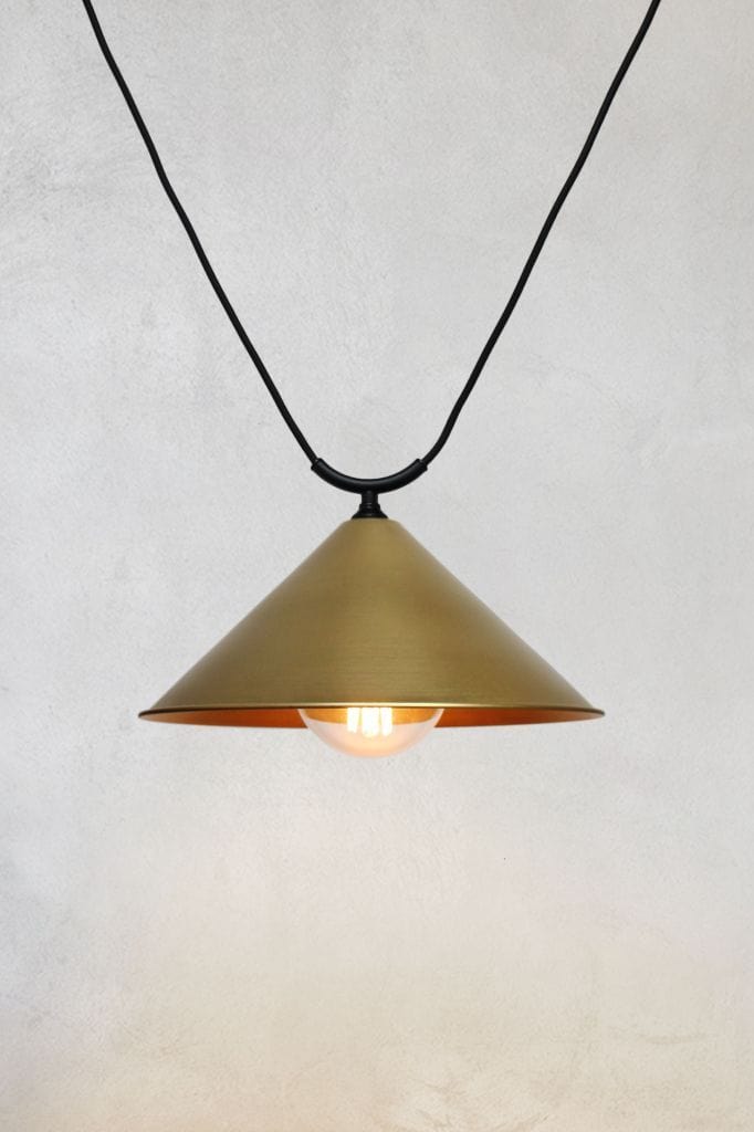 Large bright brass cone shade on trapeze pendant