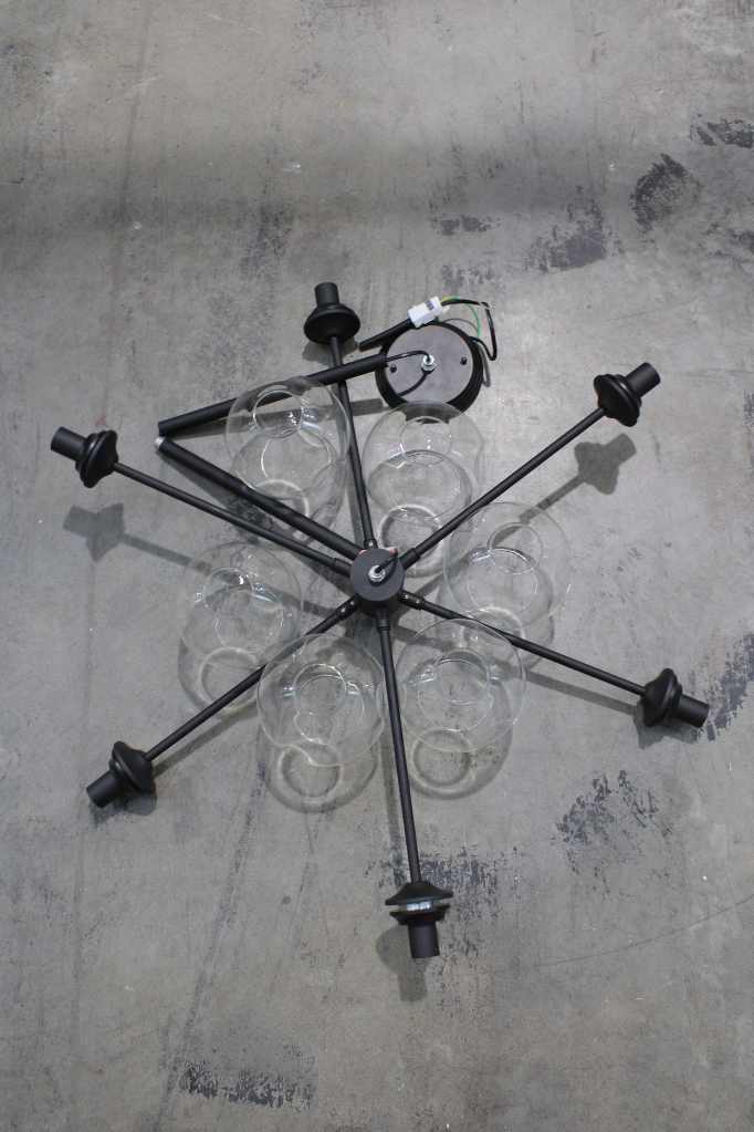 Disassembled six light chandelier in black