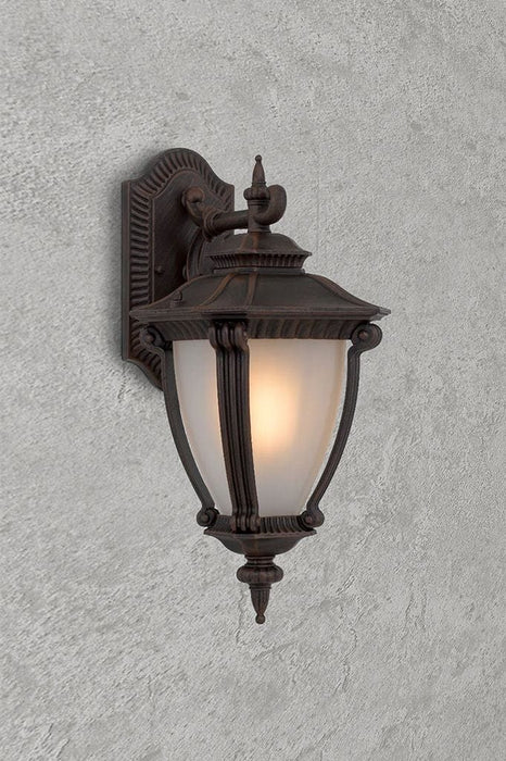 Outdoor wall light in antique bronze finish. 