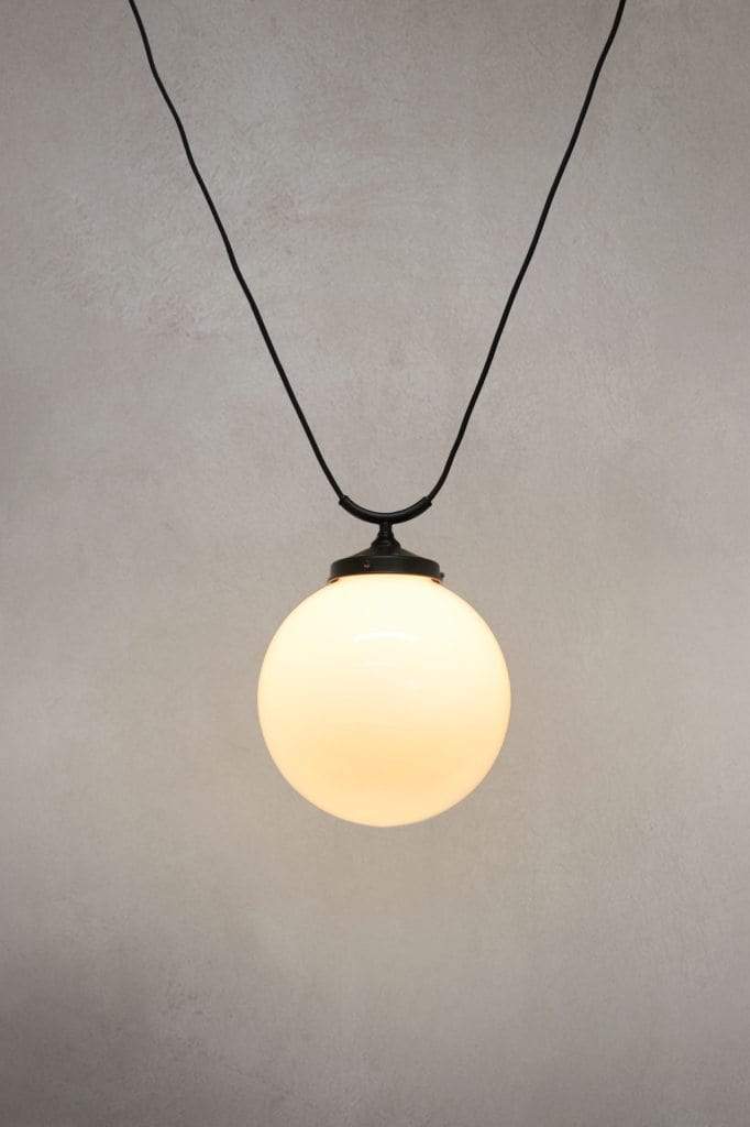 Medium round opal glass shade with trapeze pendant cord