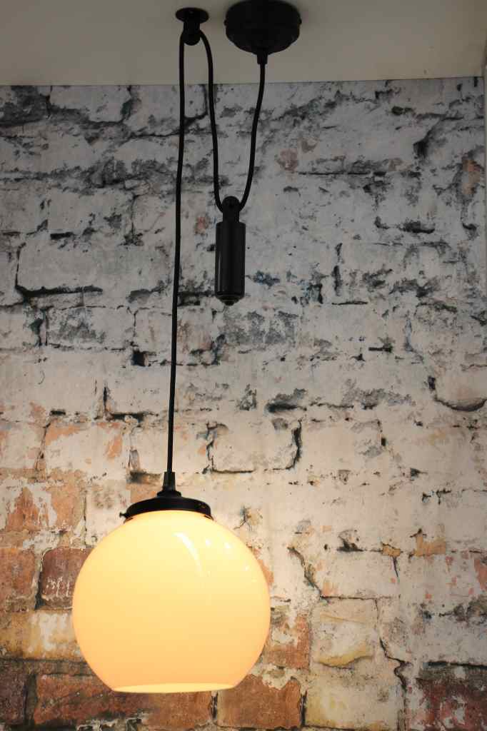 medium round open glass shade with pulley suspension cord