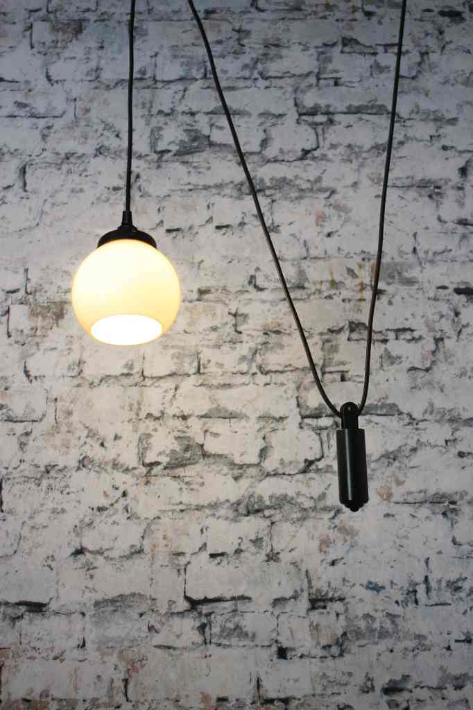 small round open glass shade with pulley suspension cord