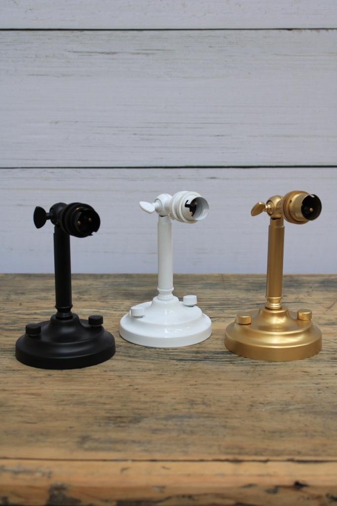 Black, white and gold/brass wall sconces