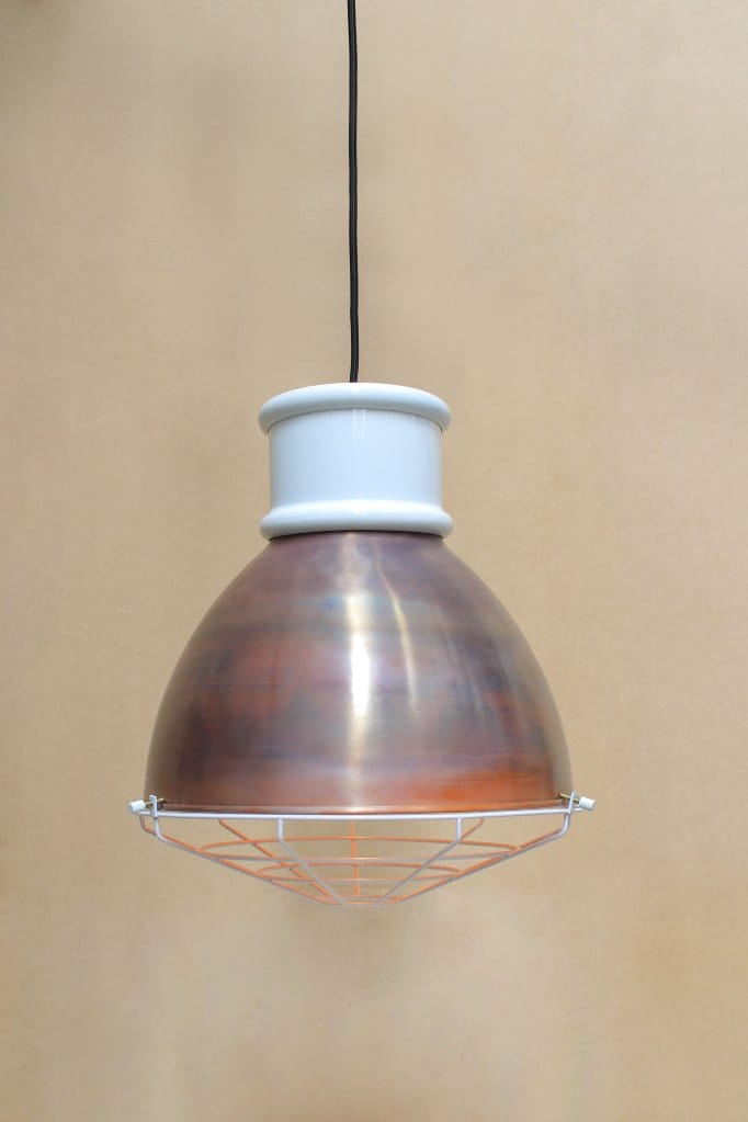 Aged copper shade with short white cover and cage