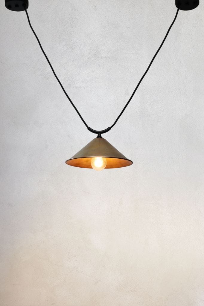 Small aged brass cone shade on trapeze pendant