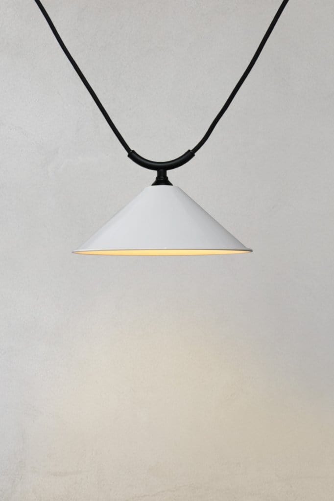 Small white steel cone shade on trapeze pendant