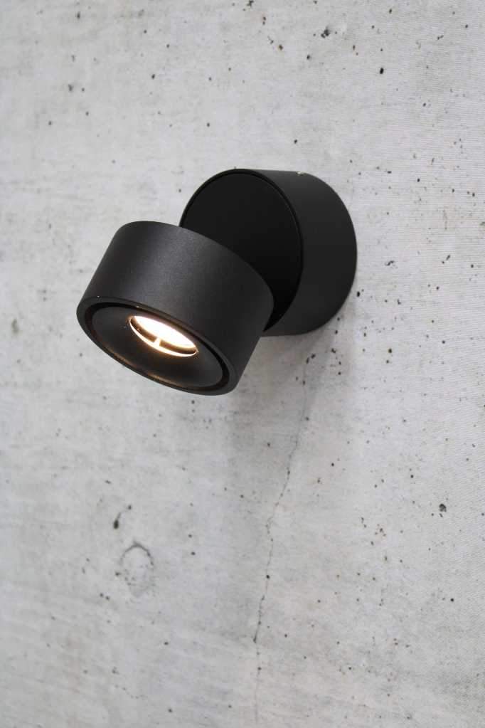 Tiltable black metal wall light