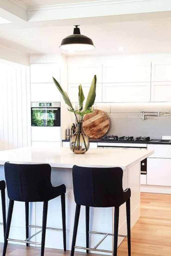 Warehouse batten light above kitchen island bench