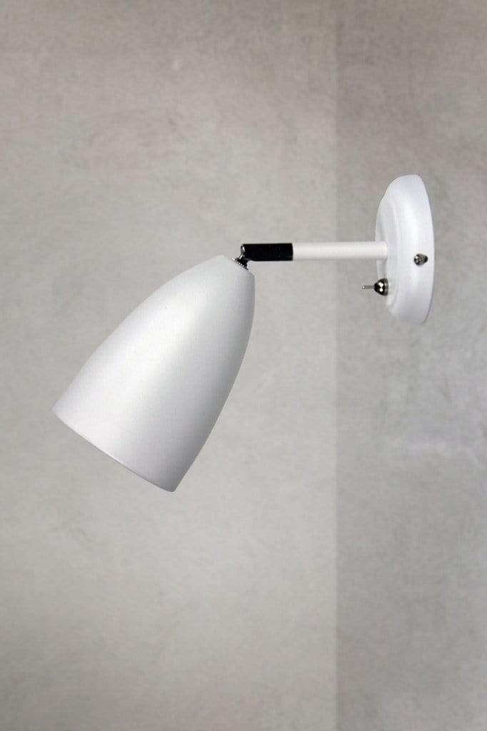 Tiltable wall light in white finish