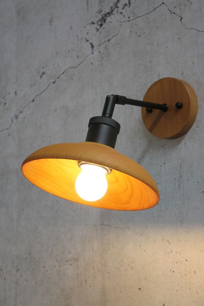 wooden wall light with matt black arm