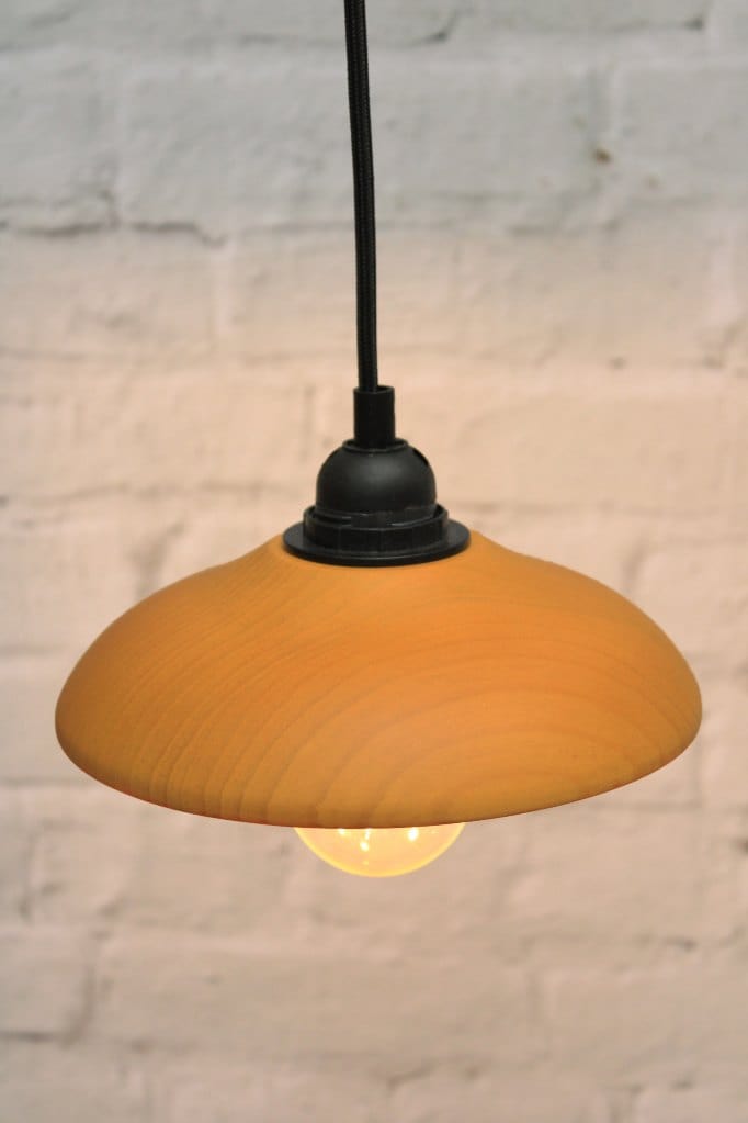 Small wooden shade with black cord