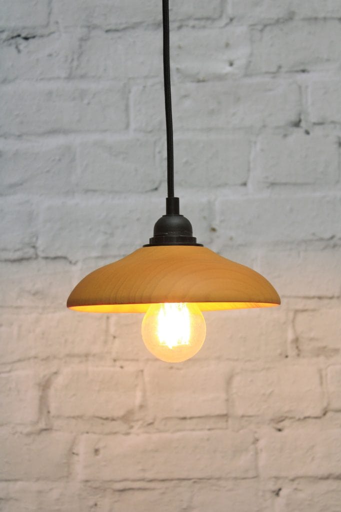 Small wooden shade with black cord