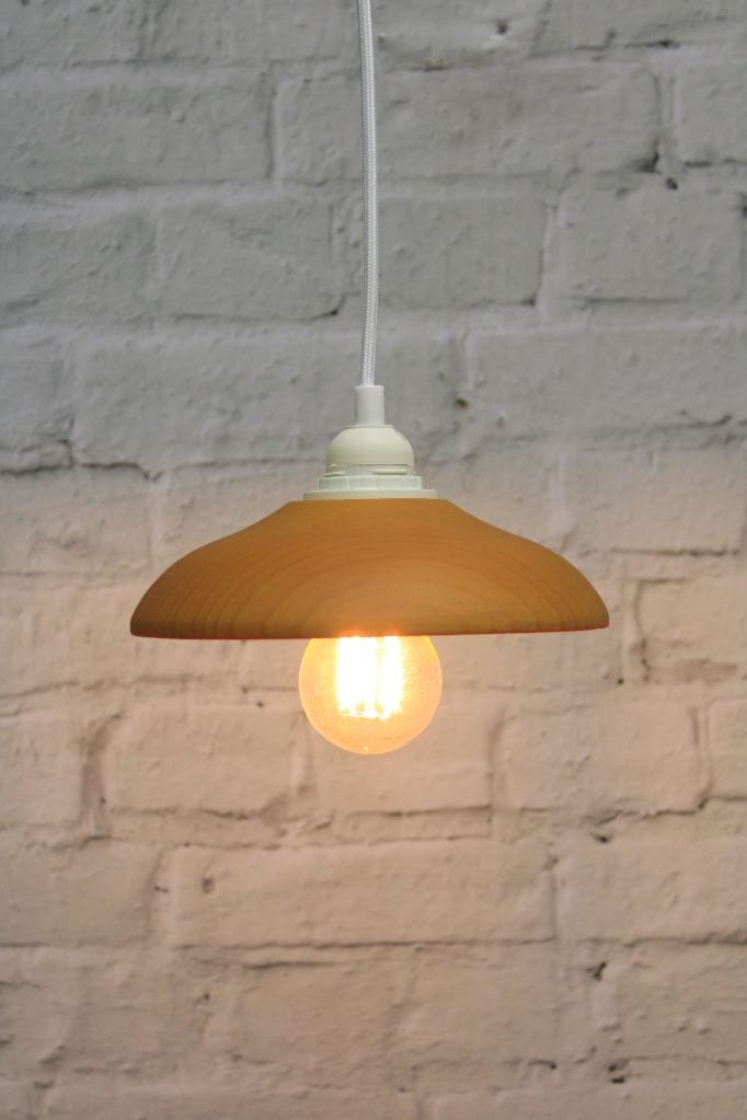 Small wooden shade with white cord